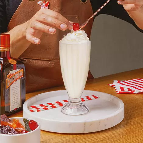 Garnishing with a cherry on the top