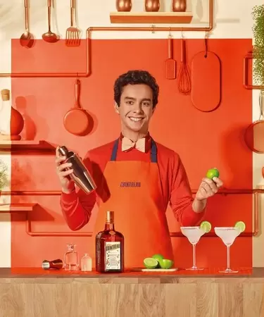 Alfred cointreau and a bottle of triple sec